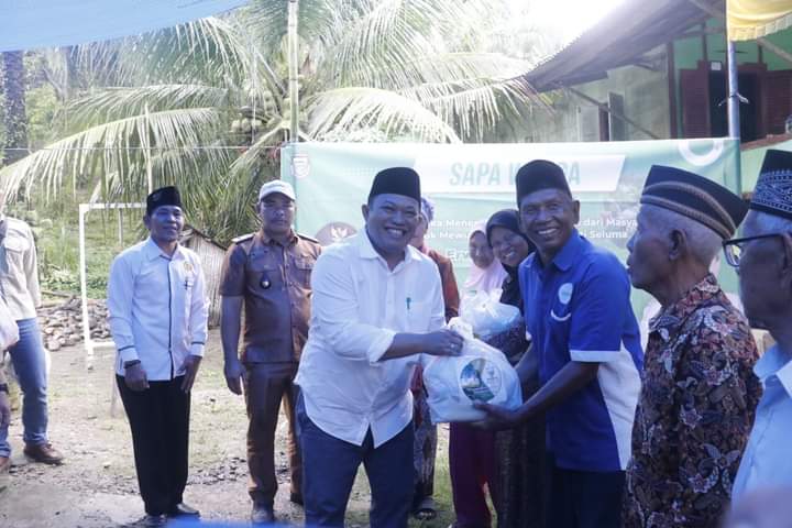 Terobos Hujan, Bupati Seluma Kunjungi Desa Muara Danau