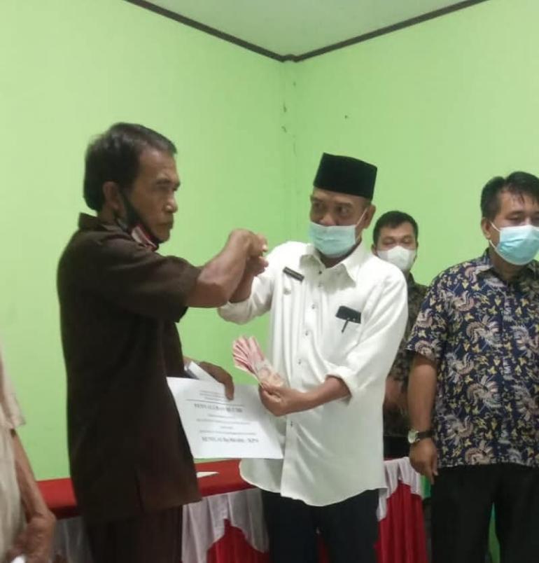 Pelaksnaan Penyaluran BLT Dana Desa Tahap I Tahun 2022 Di Desa Bandung Agung