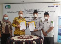 Direktur PDAM Kota Bengkulu bersama Bank Mandiri