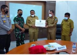 Bupati BU Serahkan Bantuan Kemanusiaan Senilai Rp 112 Juta Untuk Korban Erupsi Gunung Semeru di Lumajang